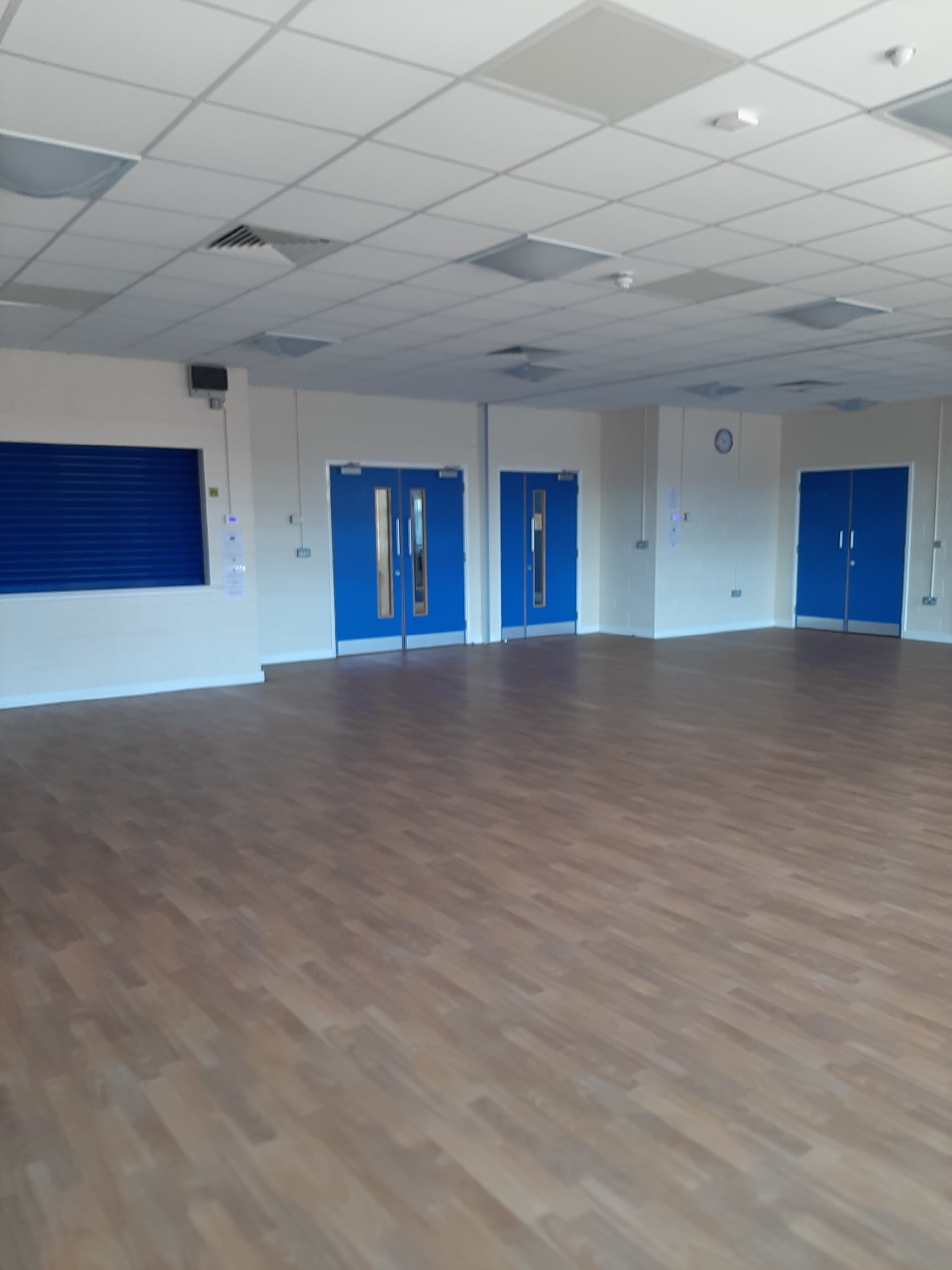 Interior of the Main Hall, looking towards the internal doors and kitchen shutter